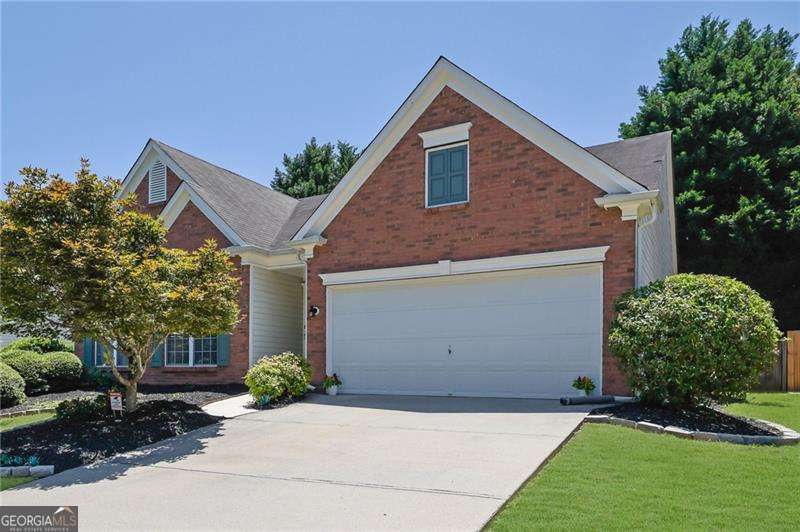 This immaculate 3-bedroom, 2-bath ranch-style home in the sought-after Brookshire community of Woodstock, GA, offers a blend of modern updates and prime location. With new flooring, a brand-new HVAC system, and a new roof installed, it's move-in ready. The open-concept layout features a sunlit family room and a formal dining area, ideal for entertaining. The updated eat-in kitchen boasts quartzite countertops and a gold stainless apron sink. The owner's suite includes a spacious bedroom, a master bathroom with elegant marble tile, and a custom-designed walk-in closet with built-in shelving. Additional bedrooms offer versatility for guests or a home office. Enjoy peaceful mornings in the sunroom overlooking the landscaped, fenced backyard. brookshirehoa.com Brookshire residents enjoy amenities such as two outdoor pools, two clubhouses, six lighted tennis courts, six lighted pickleball courts, a basketball court, a playground, and scenic walking trails leading to Olde Rope Mill Park. The community's location provides quick access to I-575, downtown Woodstock, and the Outlet Shoppes of Atlanta, offering a perfect balance of suburban tranquility and urban convenience.