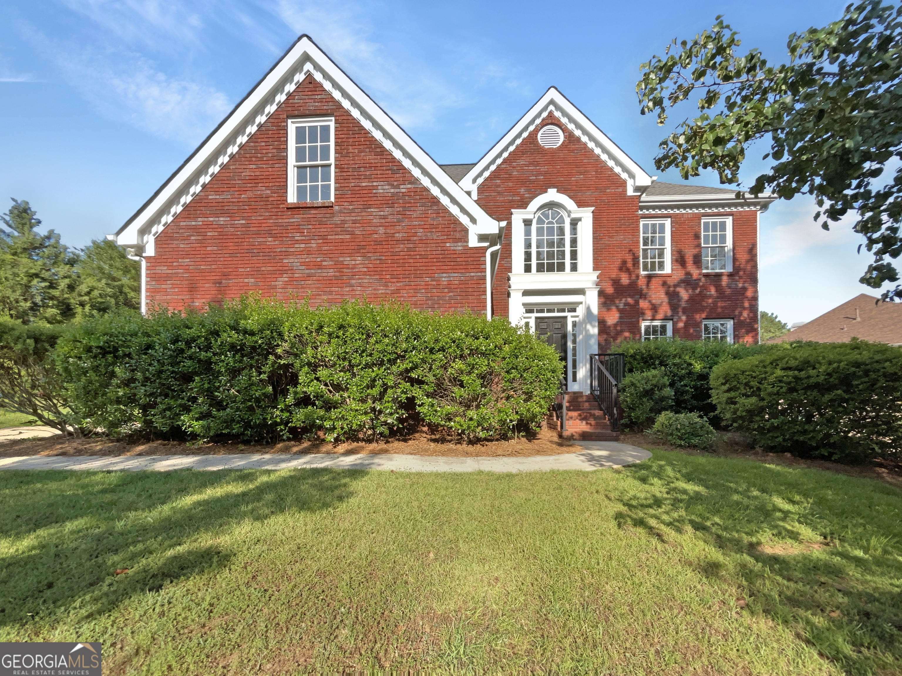 Welcome to this beautifully maintained 4-bedroom, 2.5-bathroom home in the sought-after Brookwood school district! Situated on over half an acre, this spacious home offers comfort, functionality, and convenience in a well-established neighborhood. Step into the inviting two-story foyer that sets the tone for the light-filled interior. The formal living and dining rooms provide elegant spaces for entertaining or hosting family gatherings. The open-concept layout connects the kitchen and family room, making it ideal for everyday living. The eat-in kitchen features classic white cabinetry, a center island, and ample counter space, while the family room offers a cozy fireplace as the perfect focal point for relaxing evenings. Upstairs, the vaulted primary suite impresses with its generous sitting area, walk-in closet, and luxurious bath featuring dual vanities, a jetted soaking tub, and a separate shower. Three additional bedrooms share a full bath, and one of them offers direct access-perfect for guests or a teen suite. The laundry room is conveniently located upstairs, close to the bedrooms for added ease. Recent upgrades include a brand-new HVAC system, fresh interior paint, and new carpet, making this home truly move-in ready. Enjoy outdoor living with the spacious backyard offering room to relax, play, or garden on this expansive lot. Ideally located near Five Forks Trickum Rd, Ronald Reagan Parkway, and The Shoppes at Webb Ginn, you'll enjoy easy access to shopping, dining, parks, and top-rated schools. Don't miss this opportunity to own a stunning home in one of Lilburn's most desirable areas!
