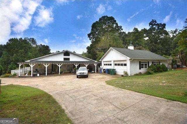 Photo of 772 Old Lathemtown Road, Canton, GA 30115 (MLS # 10805105)