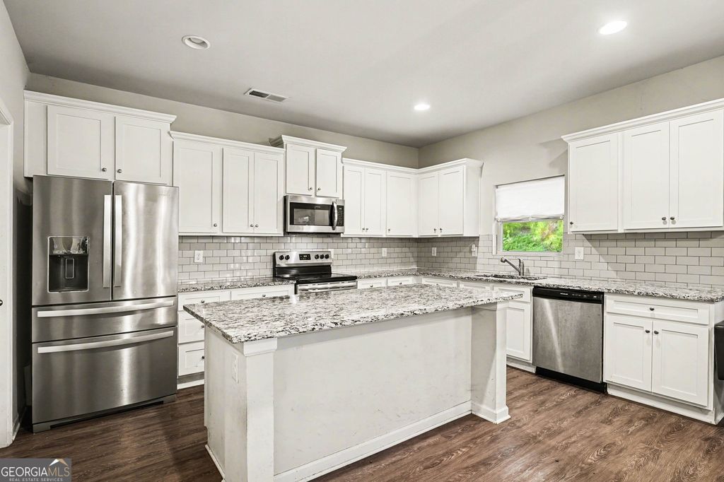 Photo of 411 Arden Place, Ellenwood, GA 30294 (MLS # 10742061)