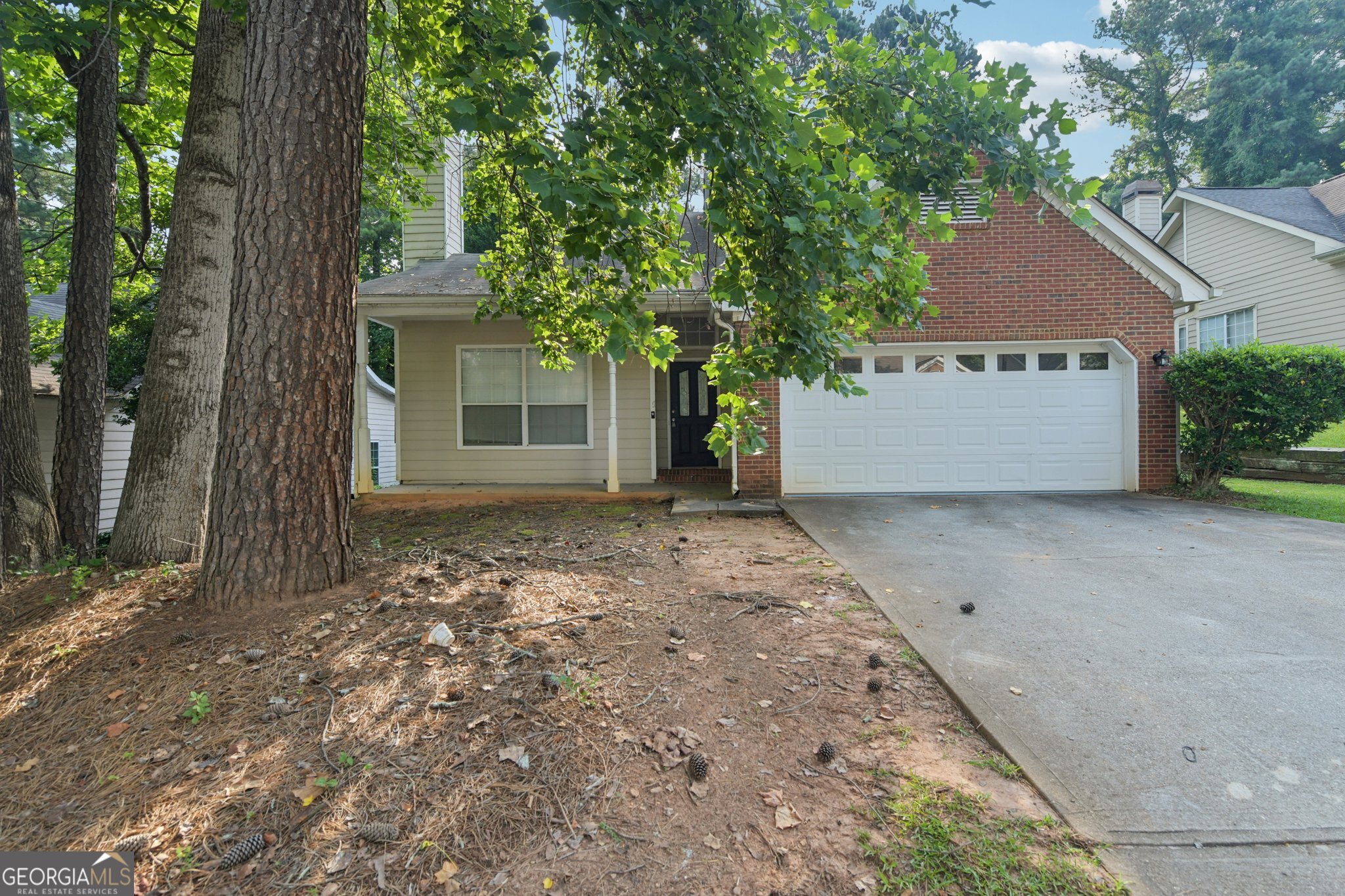 Charm and curb appeal abound for this Lithonia home! Step inside into the well-appointed family room, which features a fireplace, and into the home's dining room. The kitchen boasts a 4-piece appliance package, ample storage and hard surface countertops. You'll find the primary suite on the main level along with the home's laundry room and an additional half bathroom. Up the stairs onto the second floor are two secondary bedrooms and a full bathroom. Schedule and see for yourself the possibilities that this home has to offer!