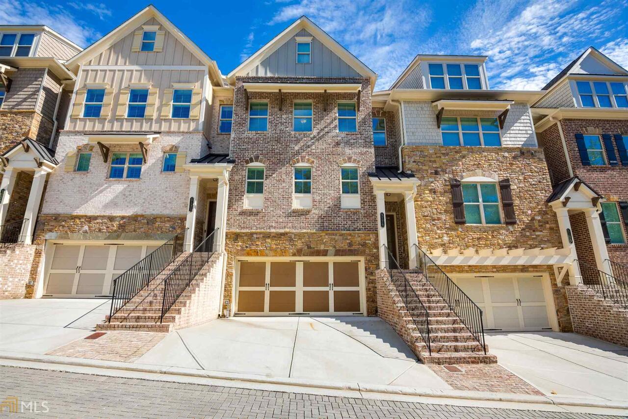 Incredible value in this beautiful custom built townhome in Vinings. Chefs kitchen, custom cabinetry, granite counters & all high-end SS appliances. This spacious townhome offers lge FR that opens to the brightly lit kitchen. Custom shelving & heavy molding throughout. Lge master BA has sep garden tub & shower. Bonus floor on 4th lvl is finished. Smart home system incl Samsung smart hub, arlo wireless cameras, echobee thermostat, led lights connected to the hub. This tucked away community is in the heart of Vinings. Must see, nothing compares on the price per sq ft.
