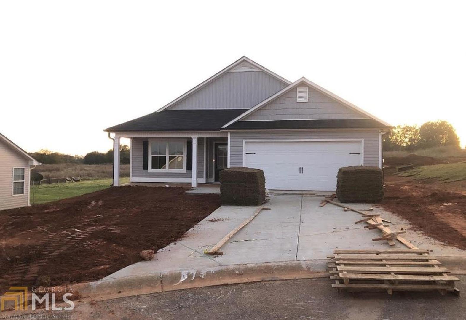 Farmhouse inspired design inside & out! PLAN: The Ansley Plan - New Construction Farmhouse Style 3 Bedroom/ 2 Bathroom home in the City of Carnesville, Georgia. LOW MAINTENANCE! The subdivision is conveniently accessible to I-85, Commerce GA, Athens GA, Anderson SC, Shopping, & Historic Downtown Carnesville! Covered back patio! Homes offer: An Open Floor Plan, Vaulted Ceiling, Tray Ceiling in Master, In-Suite Master Bathroom, Walk-In Master Closet, W/D Hook-Ups, Automatic Double Car Garage, Stainless Appliance Package, Fireplace, Breakfast Bar, & MORE!