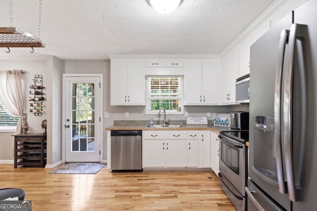 Photo of 71 Hopkins Farm Drive, Adairsville, GA 30103 (MLS # 10835340)
