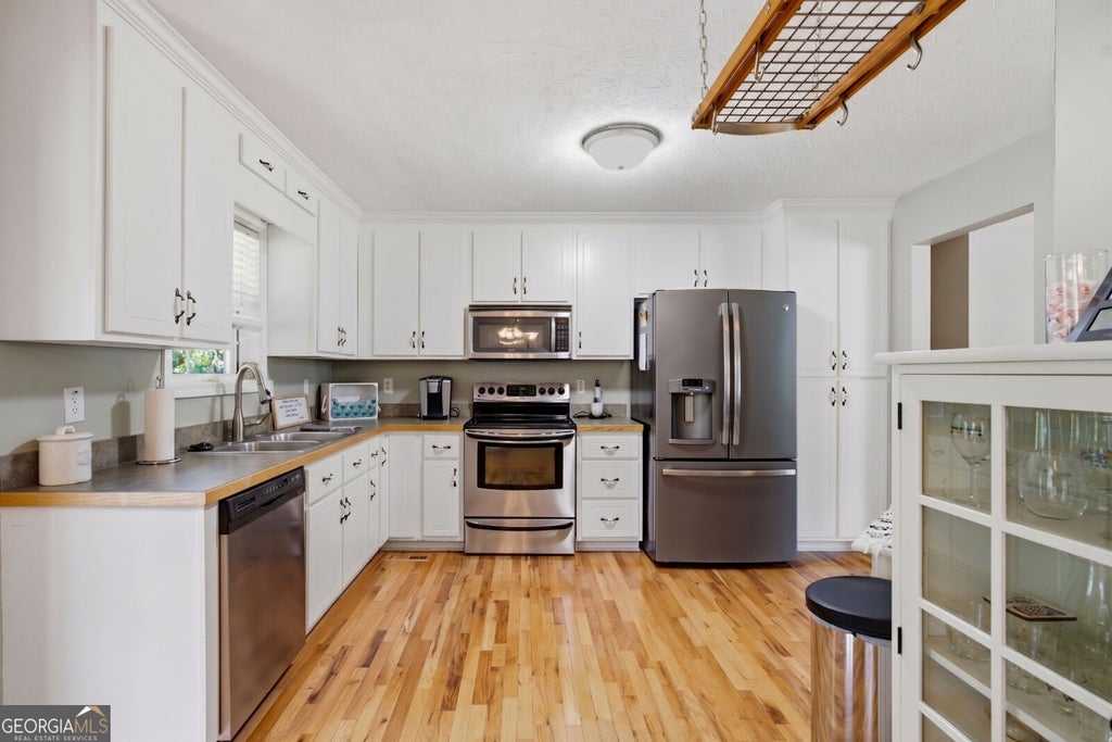 Photo of 71 Hopkins Farm Drive, Adairsville, GA 30103 (MLS # 10835340)