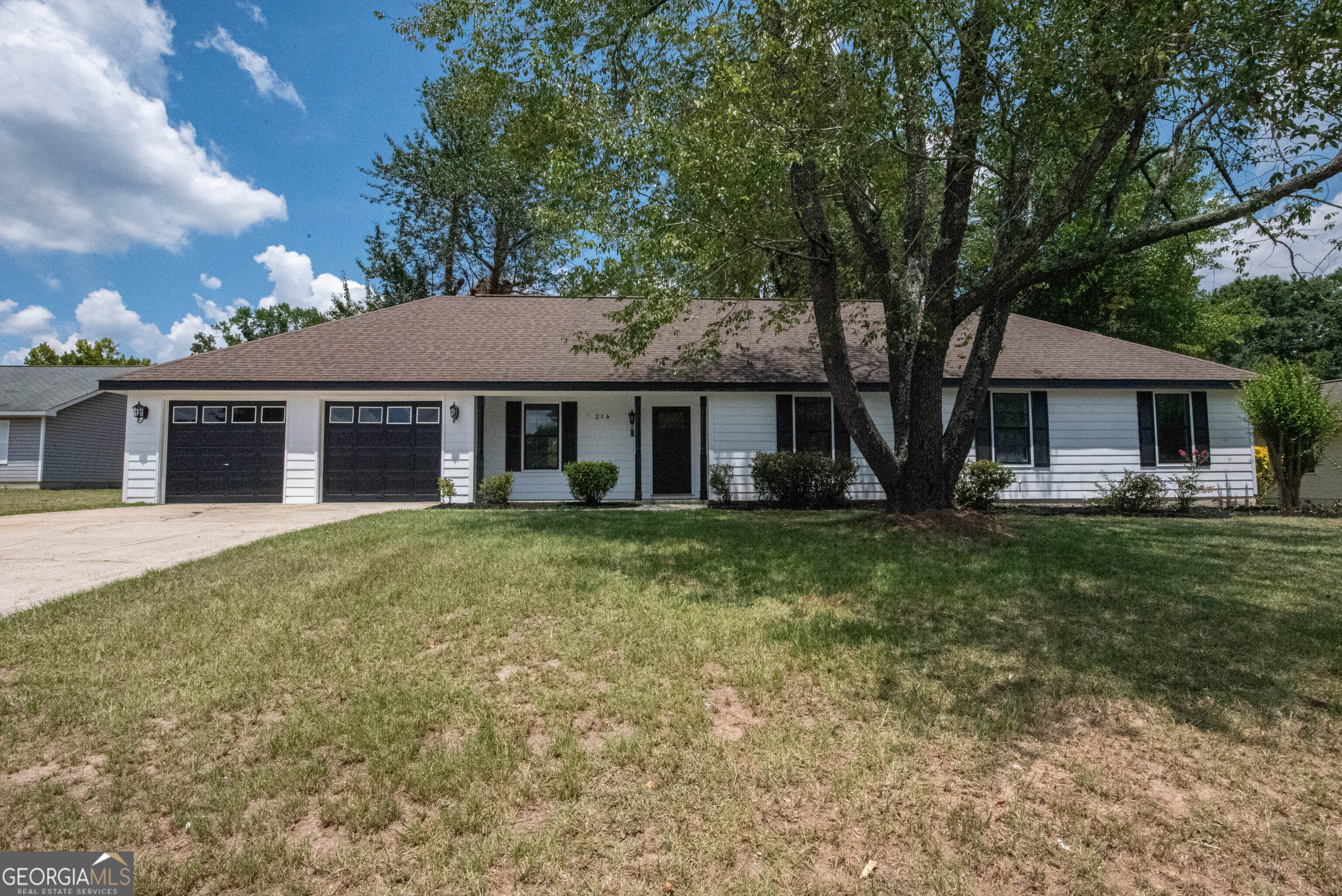 Get ready to fall in love with this beautifully updated 4-bedroom, 2-bath home! It has 2,547 square feet of space all on one level and sits on a large 0.4-acre lot. From the stylish outdoor lights to the easy keyless entry, every detail has been carefully chosen. There is fresh paint throughout, luxury flooring, and updated fixtures. The cozy living room along with the formal dining room is perfect for hosting friends and family. The kitchen offers sleek gray countertops, a new dishwasher and stove, and refreshed cabinets. You'll also love the oversized laundry room which gives you plenty of extra space. There's even a bonus area in the back that could be used as a game room, workout space, or for entertaining. This home is the perfect mix of style, comfort, and convenience. It's move-in ready and waiting for you!