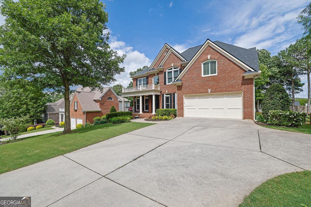 Welcome to this exceptional John Wieland resale located in the highly sought-after Enclave section of Creekside, a community where homes rarely become available. Showcasing over $160,000 in premium upgrades since 2021, including BRAND NEW WINDOWS throughout (2022), a show-stopping wrought iron front door (2022), NEW CARPET throughout (2024), NEW HVAC upstairs (2022), NEW KitchenAid double ovens (2023), and a new fully-fenced backyard. Plus, BRAND NEW FINISHED BASEMENT completed in 2025 adds a private bedroom and full bath, with a soundproofed ceiling, ideal for a guest suite, media room, or studio. On the main level, enjoy a dedicated office, formal dining room, and a dramatic 2-story great room filled with natural light. A beautiful screened porch provides the perfect place to relax or entertain. Upstairs, you'll find 4 bedrooms, including a luxurious owner's suite with a spa-inspired ensuite bath and a bonus flex room, perfect for a nursery, office, or home gym. Secondary bedrooms are connected by a Jack-and-Jill bath and the other bedroom upstairs features its own private bathroom. Enjoy resort-style living with Creekside's top-tier amenities: clubhouse, pool, tennis courts, playground, and fitness center. Located in a top-rated school district with easy access to GA-400, this home truly has it all. Welcome home!