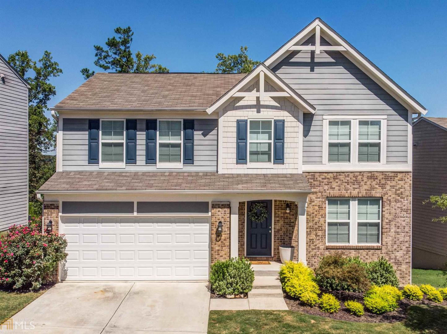 This beautiful Craftsman style home won't last long! Open concept home featuring gorgeous custom built-in cabinets with fireplace in the the living room and Pergo Timbercraft + Wetproof flooring throughout the main floor! With 4 bedrooms, 2 full baths, 2 half baths, upstairs loft, finished basement with bar, media and entertaining areas, there is space for the whole family!