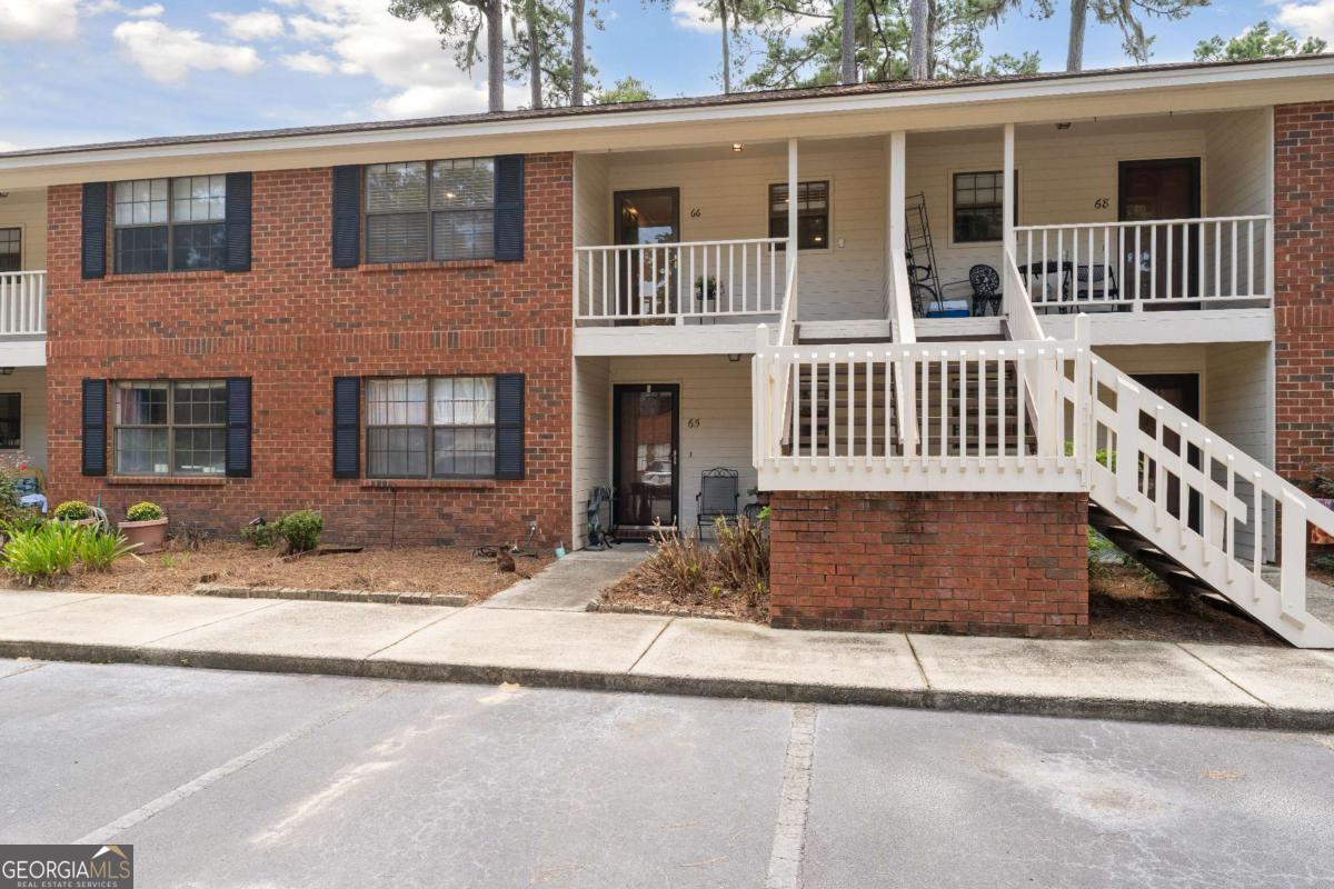 Welcome to 66 Colony Park Drive-a beautifully renovated 2 bed, 2 bath condo tucked away in the quiet, tree-lined community of Colony Park. This hidden gem offers privacy and comfort, while still being just minutes from shopping, dining, and all the conveniences of Savannah's Southside. Step inside to find a thoughtfully renovated interior featuring a stylish kitchen with brand-new cabinetry, open shelving, green tiled walls, butcher block countertops, and stainless steel appliances. The primary suite offers a private en suite bath complete with a walk-in shower. A screened-in balcony creates the perfect spot to sip your morning coffee or unwind at the end of the day while enjoying the fresh air. Community amenities include an inground pool and a serene setting that feels worlds away-yet with quick access to everything Savannah has to offer. Whether you're looking for your first home or downsizing, this move-in ready condo checks all the boxes.