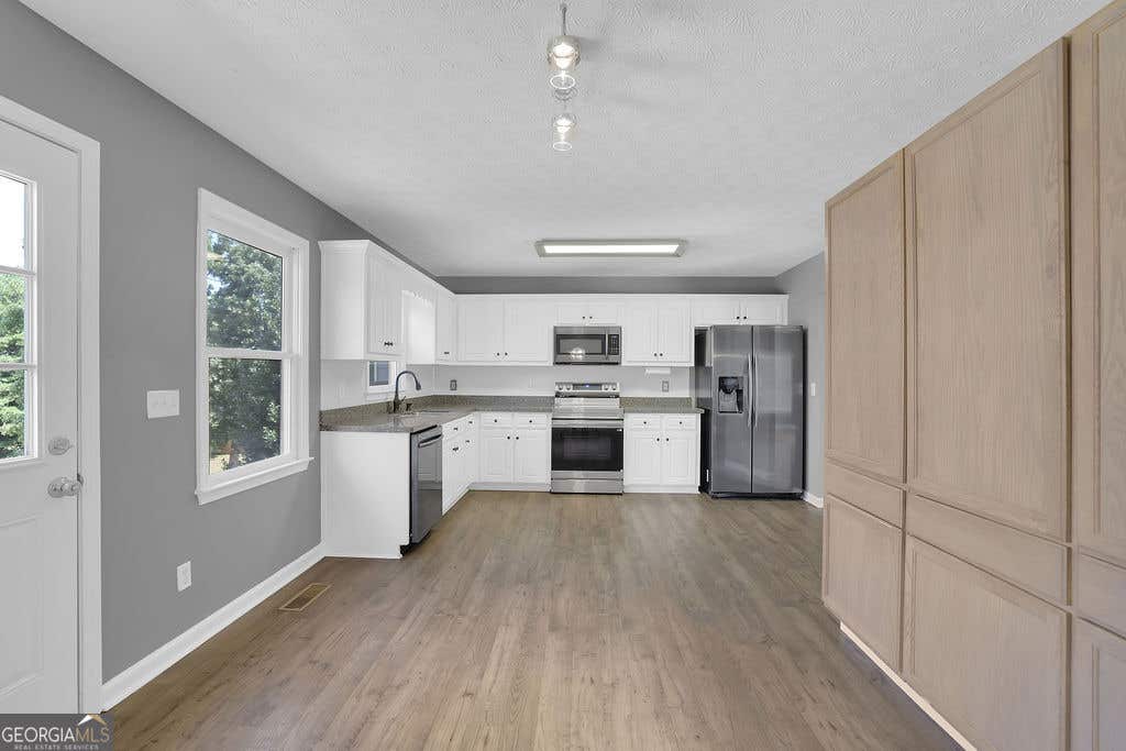 Photo of 200 Fate Conn Road, Canton, GA 30114 (MLS # 10834012)