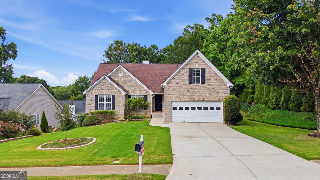 Photo of 310 Cedarhurst Road, Lawrenceville, GA 30045 (MLS # 10826912)
