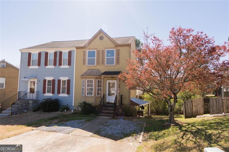 UTILITIES INCLUDED!! Discover this beautifully renovated 2-bedroom, 2.5-bath townhome in the heart of East Cobb, just minutes from shopping centers, Marietta Square, Town Center Mall, Kennesaw State University (KSU), and with easy access to I-75. This charming home features hardwood floors throughout, a spacious open-concept main level with a cozy fireplace, and a modern kitchen with plenty of cabinet space. Upstairs, you'll find two master bedrooms, each with its own private en-suite bathroom, separated by a convenient laundry room with washer/dryer hookups. A French door leads to a private covered back deck, perfect for outdoor relaxation. With utilities included-gas, electricity, water, and garbage-you can enjoy worry-free living for just $1,900/month. The home also offers two assigned parking spaces for added convenience. Don't miss this incredible opportunity to live in a prime location with everything you need at your fingertips! Hablamos espanol -schedule your tour today! The property offered for lease is the main floor and upper level, while a separate terrace-level apartment is already leased. Each residence features its own private entrance, providing a sense of exclusivity and convenience.