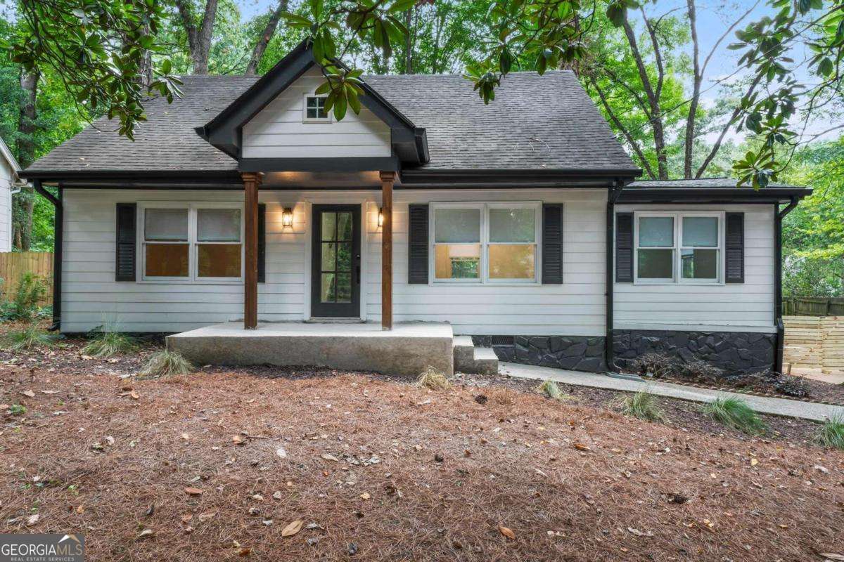 This charming, fully renovated ranch in sought-after Ridgewood Heights is move-in ready and full of character. From the moment you step inside, you'll notice the superior craftsmanship and thoughtful design throughout. Boasting 4 spacious bedrooms and 3 luxurious bathrooms, this home features a wide open-concept living area perfect for everyday living and entertaining. The completely updated kitchen is a chef's dream with abundant cabinetry, premium countertops, stainess steel appliances, and a convenient stackable washer and dryer with a barn door barincluded. Step outside to enjoy the expansive back deck, ideal for morning coffee or hosting friends. The fabulous backyard features fire pits-perfect for cozy gatherings or relaxing evenings under the stars. Tucked between the desirable Bolton and Paces neighborhoods, this home is ideally located just off Moore's Mill Road, offering easy access to I-75, top-rated schools, shopping, and the Chattahoochee River parks. Don't miss your chance to get into this rapidly appreciating area-schedule your showing today! APPOINTMENT ONLY. DO NOT USE SHOWINGTIME.
