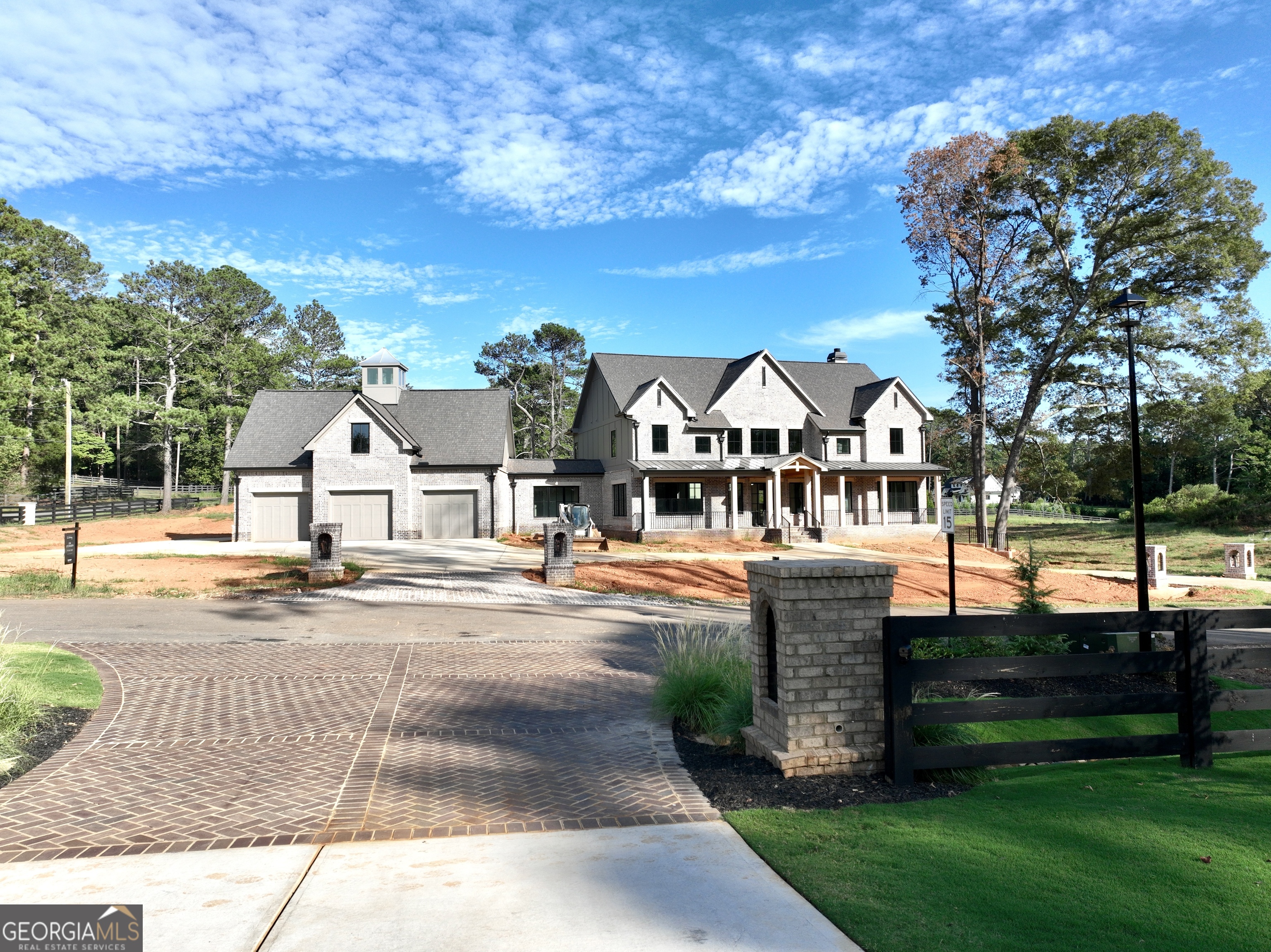 Use 250 Old Jones Rd. Alpharetta, Ga. 30004 for GPS. Welcome Home to this Exquisite Craftsman-Style Home, A True Masterpiece of Elegance and Charm. This Beautiful Home is set to be finished in October 2024. Located in the Highly Coveted Cherokee County, Alpharetta, Georgia. This stunning residence offers the Perfect Fusion of Suburban Tranquility and Urban Convenience. Impeccable Brick Construction on All Sides Exudes Timeless Sophistication. We offer, Top of the Line Wolf, Sub-Zero, and Cove Appliances that will elevate your Culinary Experience. Our Locally Crafted Custom Built Cabinets and Stain in Place Hardwood Flooring Enhance this Beautiful Living Space. You Will Be Mesmerized by the Show Stopping Black Metal and Glass Staircase System. Control Your Climate, Surround Sound, and Lights All From an App on Your Phone. Our Meticulously designed His and Her Master Closets are Crafted for the Most Discerning Client. The Outdoor Living Area is a Thoughtfully Designed Covered Patio and is Equipped with Wolf appliances, Elegant Herringbone Brick Detailing and Includes Flush Mount Exterior Heaters for those Chilly Evenings. We Include Upscale Details from Intricate Trim Details throughout, to Custom Designed Solid White Oak Beams, to our One of A Kind Designer Light Fixtures. We Craft our Homes With Premium F Wave Synthetic Roof Shingles that offer a 50-year warranty, Class 4 Hail, and Class A fire rated protection. Our JeldWen Casement Windows offer a 10-year warranty (20 Year Glass Warranty) to ensure durability and longevity. The Total Square Footage includes heated main living, finished basement, and bonus square footage, along with 1997 square feet for front and rear porches plus garage for a total of 9810 Square Feet. Enjoy easy access to top-rated schools, parks, shopping centers, and dining options. Showings will be scheduled upon receipt of Proof of Funds (POF) or Prequalification Letter. Listing agent will be present for all showings. Security Camera's in Use.