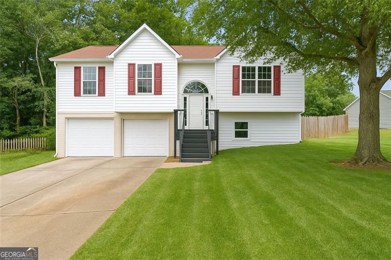 Welcome to this beautifully updated 4-bedroom, 3-bath home in a prime Acworth location! Step inside to find a bright, open layout designed for comfort and entertaining. With four spacious bedrooms and three full baths, there's room for everyone to relax and enjoy. Move-in ready featuring new modern kitchen cabinets and finishes, this home offers both style and functionality. Step outside to a brand-new deck overlooking a generous backyard - ideal for gatherings, play, or simply relaxing outdoors. With its close proximity to Lake Allatoona, I-75, shopping, and dining, this property offers the perfect blend of comfort and convenience. A rare find you don't want to miss! Don't miss your chance to make this stunning home your own.