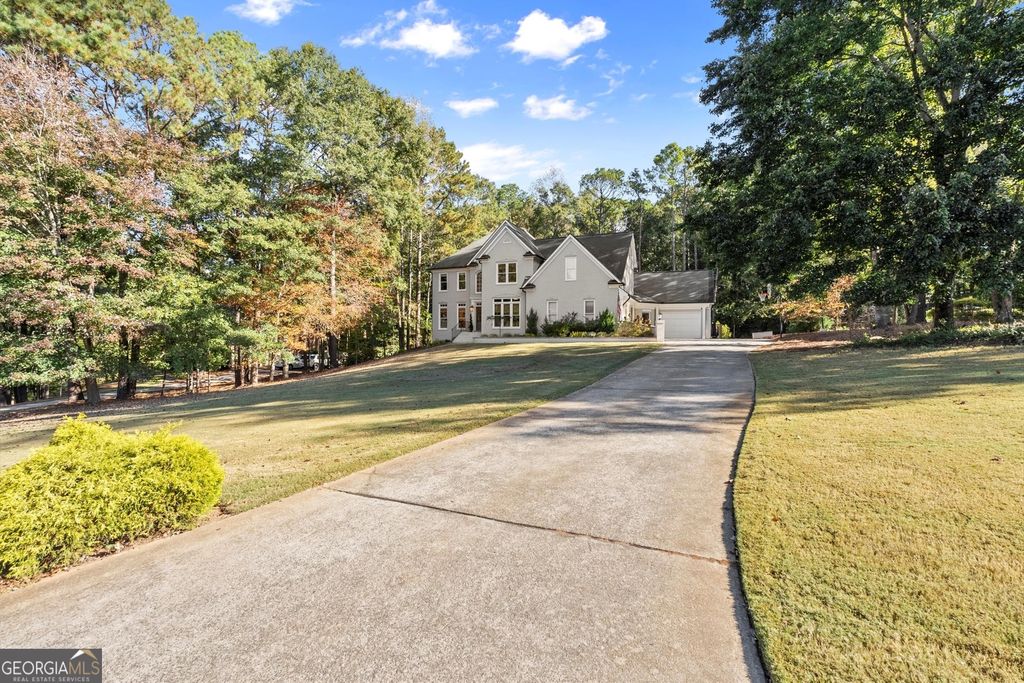 Photo of 370 Woodcreek Ln, Fayetteville, GA 30215 (MLS # 10632104)