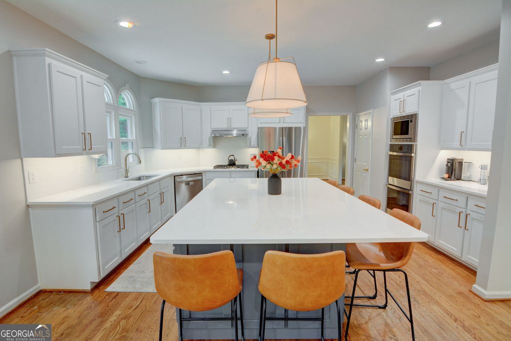 Photo of 4430 Missendell Lane NW, Peachtree Corners, GA 30092 (MLS # 10789048)