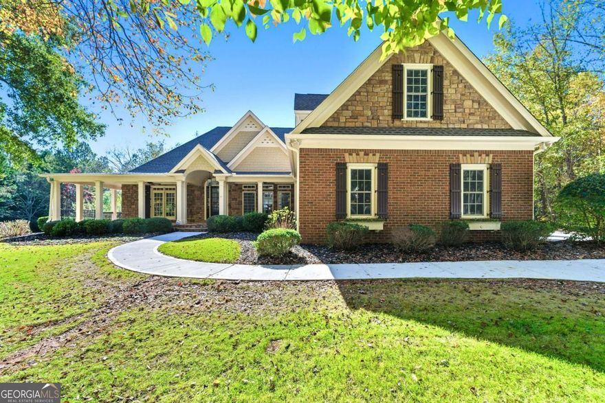 Welcome to 101 Smith Forest Ln, a peaceful Alpharetta retreat set on 2.62 private acres of wooded beauty. This fully remodeled home offers the best of both worlds-quiet privacy surrounded by nature, yet just minutes from parks, shopping, dining, and top-rated schools.    Inside, you'll find bright, open living spaces finished with all-new flooring throughout, custom cabinets, modern countertops, and upgraded appliances. The main level flows seamlessly from the formal living and dining rooms to the cozy family room, making it ideal for both everyday living and entertaining. Large windows fill the home with natural light and frame the beautiful wooded views. The spacious, redesigned kitchen sits at the heart of the home, with generous counter space and a sunny breakfast area overlooking the backyard.    The primary suite on the main level offers peaceful views, a large closet, and a private bath designed for relaxation. Secondary bedrooms on the main level each include their own ensuite bath for added comfort. Upstairs, additional bedrooms provide flexible space for family, guests, or a home office. The finished basement adds even more living area with another ensuite bedroom and room for a gym, media space, or play area.    Step outside to your private backyard oasis, complete with a sparkling pool and relaxing hot tub surrounded by nature. The wooded setting creates a park-like atmosphere perfect for entertaining, gardening, or unwinding in total privacy.    If you're looking for a move-in-ready home that combines luxury updates, space, and serenity-101 Smith Forest Ln is one you don't want to miss.