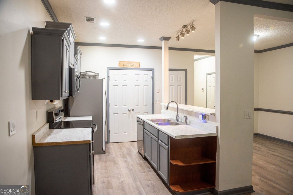 Photo of 113 Creel Way, Atlanta, GA 30349 (MLS # 10854999)