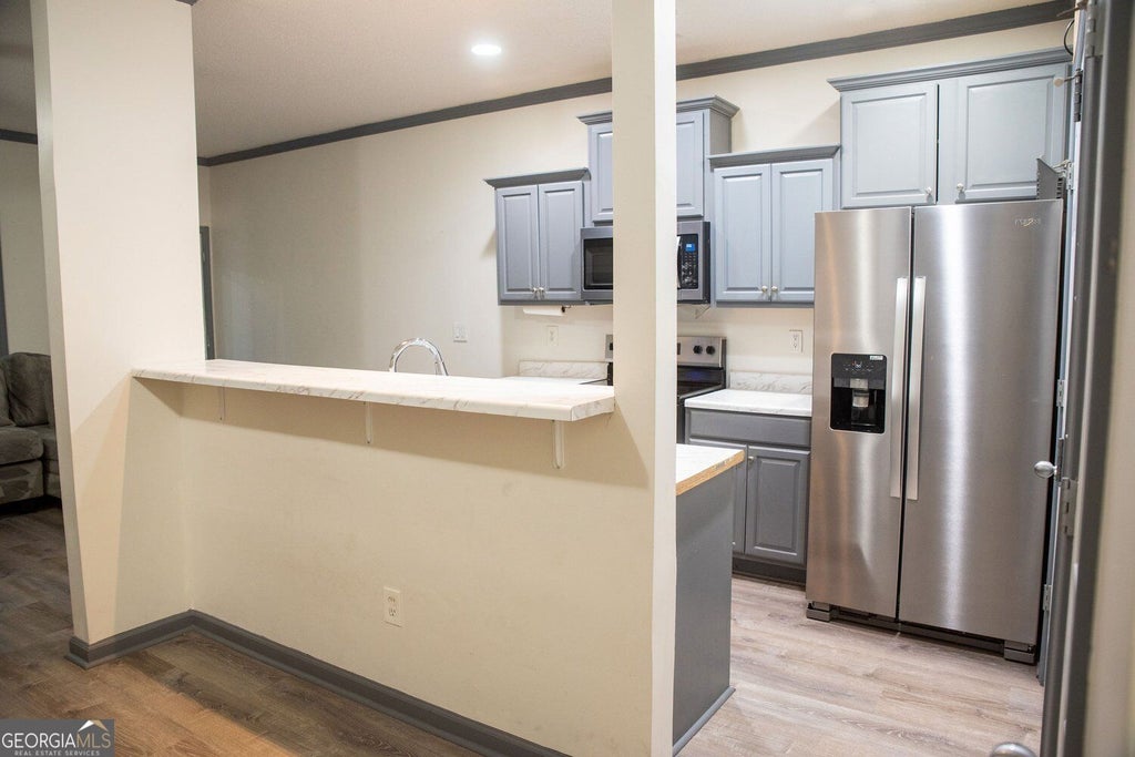 Photo of 113 Creel Way, Atlanta, GA 30349 (MLS # 10854999)
