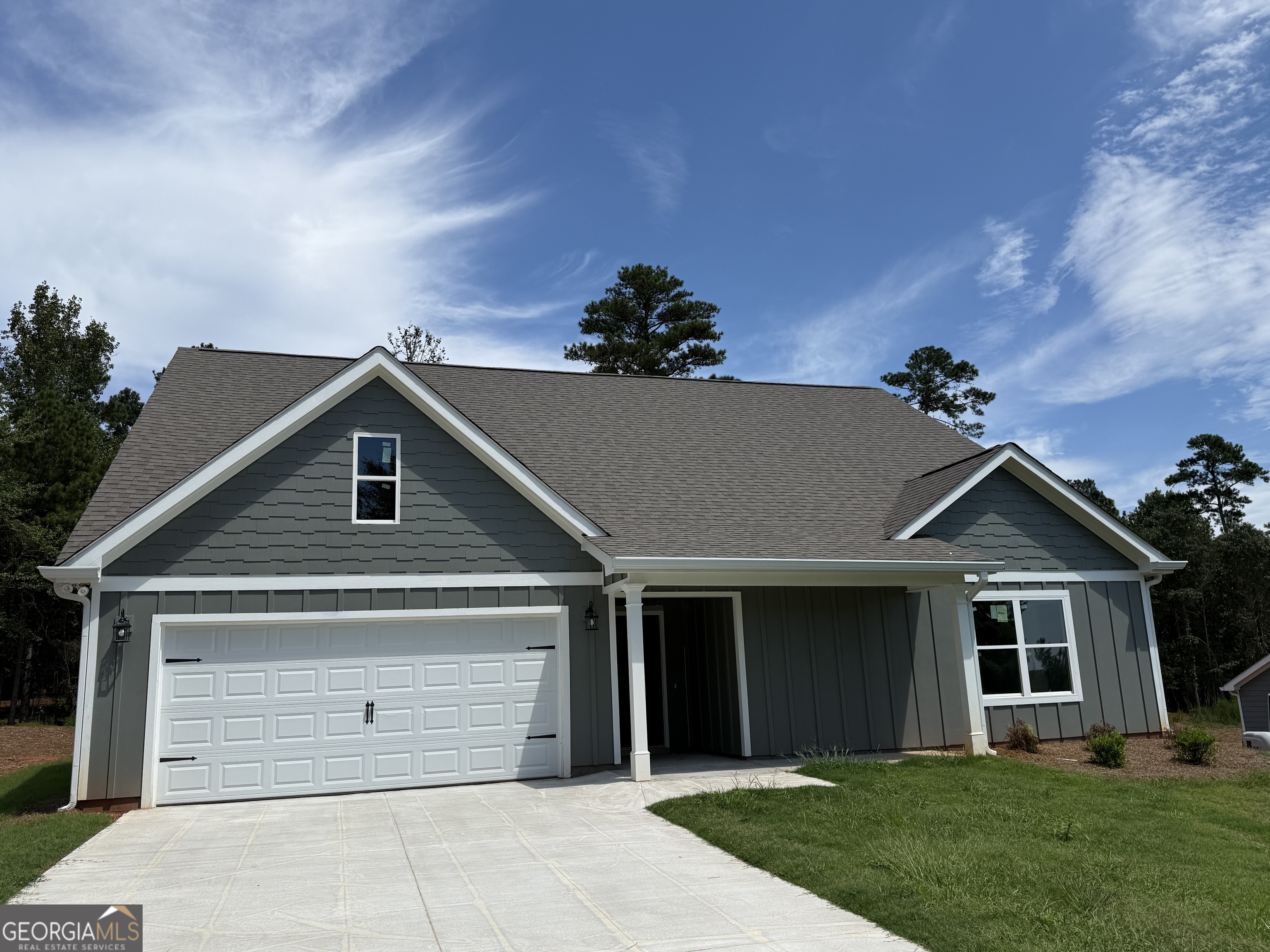 MOVE-IN READY! Beautiful new construction home offering a covered front porch, covered back patio, two-car front entry garage, 3 bedrooms, 2 bathrooms, and an open concept kitchen and vaulted great room with fireplace. The kitchen is designed for gathering with breakfast area, kitchen island, granite countertops, stainless steel appliances and walk-in pantry. The great room features an open concept with corner fireplace and natural lighting. The primary suite offers a huge walk-in closet, trayed-ceiling, and primary bath with double vanity, water closet, separate shower, soaking tub and direct access to the walk-through laundry room. The secondary/guest bath has double vanity & shower/tub combo. Call today to see this BRAND NEW HOME in this newly developed community, minutes from I-85 and Lake Hartwell! *** This same plan (The "Jacob") is also available on Lot 5! Seller Incentives towards BUYER CLOSING COSTS and/or INTEREST RATE BUY-DOWN WITH PREFERRED LENDER & CLOSING ATTORNEY!
