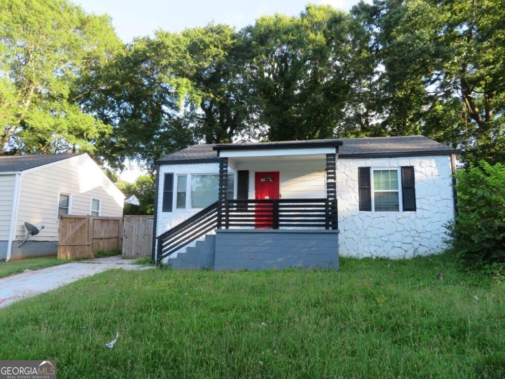 Beautiful home in Joylan Park! Covered front porch! Spacious living and dining room! Kitchen features white cabinets, stone counters, stainless steel appliances, and island with breakfast bar, open to living room! Two spacious bedrooms and two full bathrooms! Fenced backyard provides some private area for the patio! Additional shed for storage! Great location close to shopping, dining, and entertainment! Easy access to the interstate and public transportation! A must see! Submit your offer today!