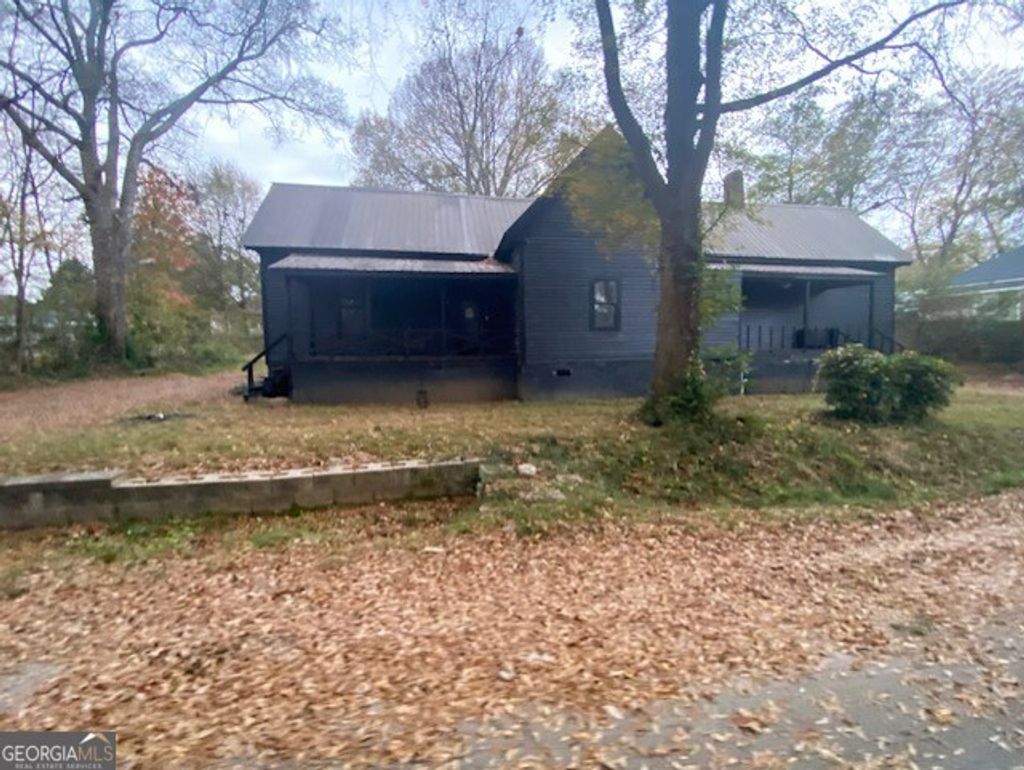 Photo of 6114 Hopkins Street NE, Covington, GA 30014 (MLS # 10698395)