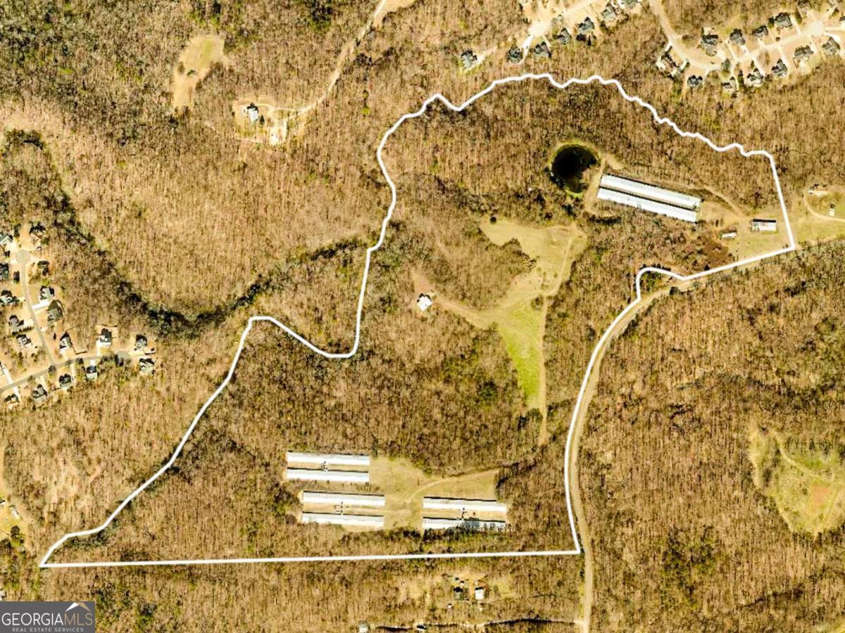 96.89 acres - Parcels included in listing 117 021A, 117 021A3, 117 21A4 Discover a rare opportunity to own 96.89 acres of beautiful, wooded land in the heart of Jackson County. Located on Pocket Road in Pendergrass, with 1,350 ft of road frontage this expansive property offers a private, rural setting while maintaining exceptional convenience, just off State Highway 60 and minutes from I-85 via the Braselton exit. Pocket Road is paved, providing easy access, and the property itself is a mix of natural hardwoods and pines, perfect for those seeking recreation, a private estate, or future development potential. Whether you're dreaming of a secluded retreat, agricultural use, or exploring development possibilities, this land delivers the space, location, and potential to bring your vision to life. Features: 96.89 wooded acres Paved road frontage on Pocket Rd Minutes to Braselton, I-85, and State Hwy 60 Ideal for recreational use, private residence, or long-term investment