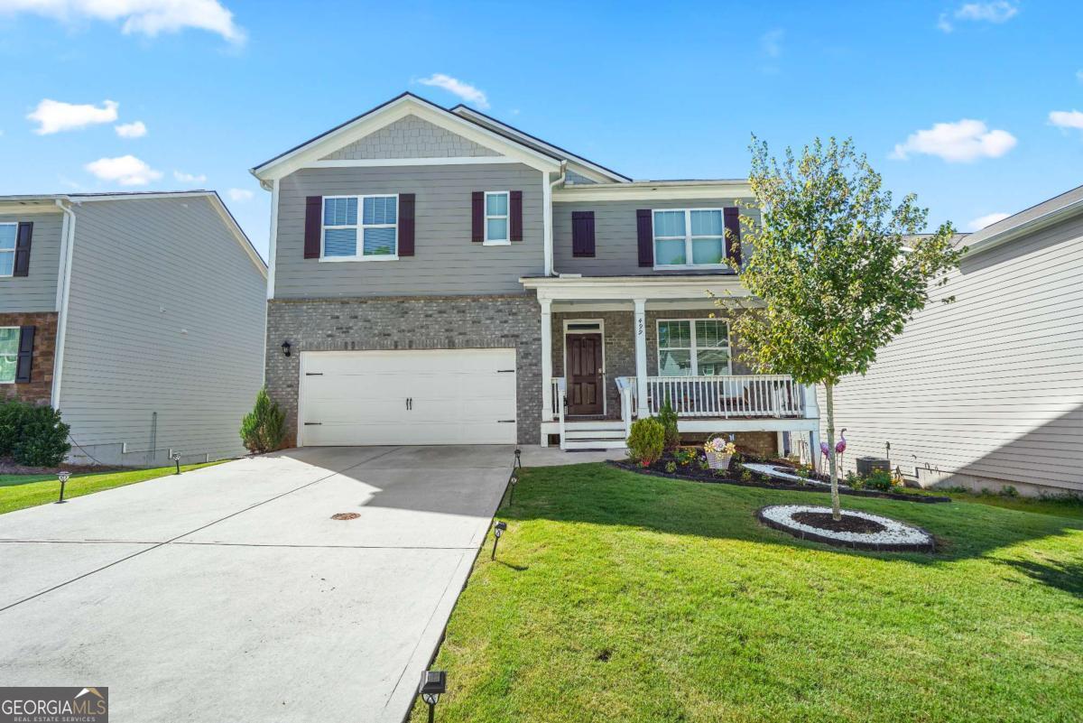 Beautiful 2-Story traditional in upcoming and fast growing Pendergrass. Better than new. Walnut Grove subdivision is conveniently located in downtown Pendergrass. This lovely home features 5 bedrooms and 3 full baths + upstairs loft. Open concept floor plan Kitchen features white cabinets, island, granite countertops, and SS appliances with view to the family room. Separate dining room. Primary bedroom offers doble vanity, soaker tub with separate shower. Large secondary bedrooms. Full unfinished basement. Easy access to I85 and Hwy 129. Community offers clubhouse, pool, and playground.