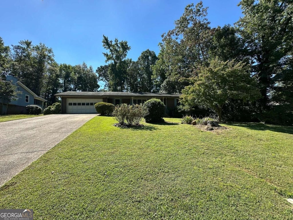 Photo of 5377 Rockmoor Drive, Stone Mountain, GA 30088 (MLS # 10869644)