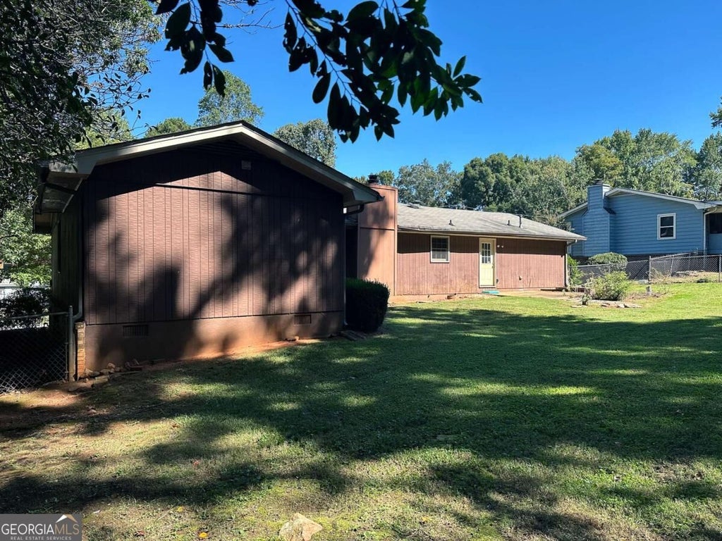 Photo of 5377 Rockmoor Drive, Stone Mountain, GA 30088 (MLS # 10869644)