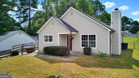 Photo of 910 Winterside Lane, Atlanta, GA 30349 (MLS # 10857522)