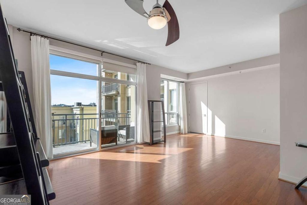 Photo of 711 Cosmopolitan Drive NE #512, Atlanta, GA 30324 (MLS # 10696318)