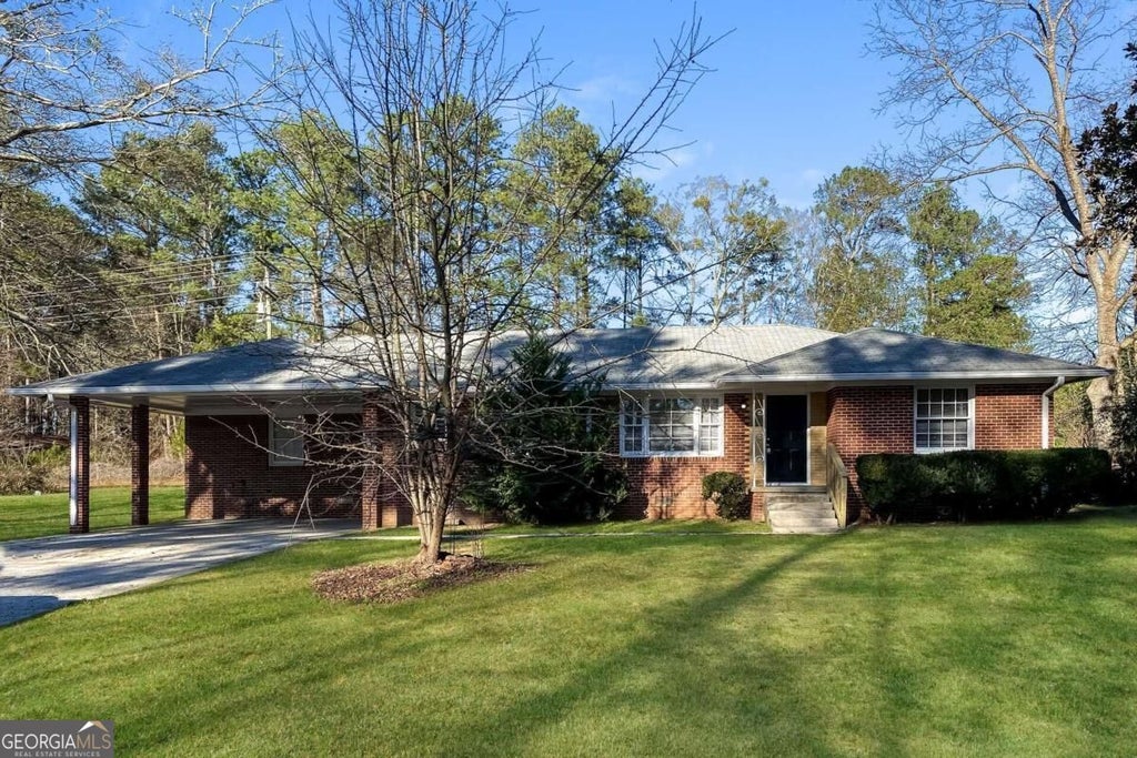 Photo of 123 New Hope Road, Fayetteville, GA 30214 (MLS # 10840686)