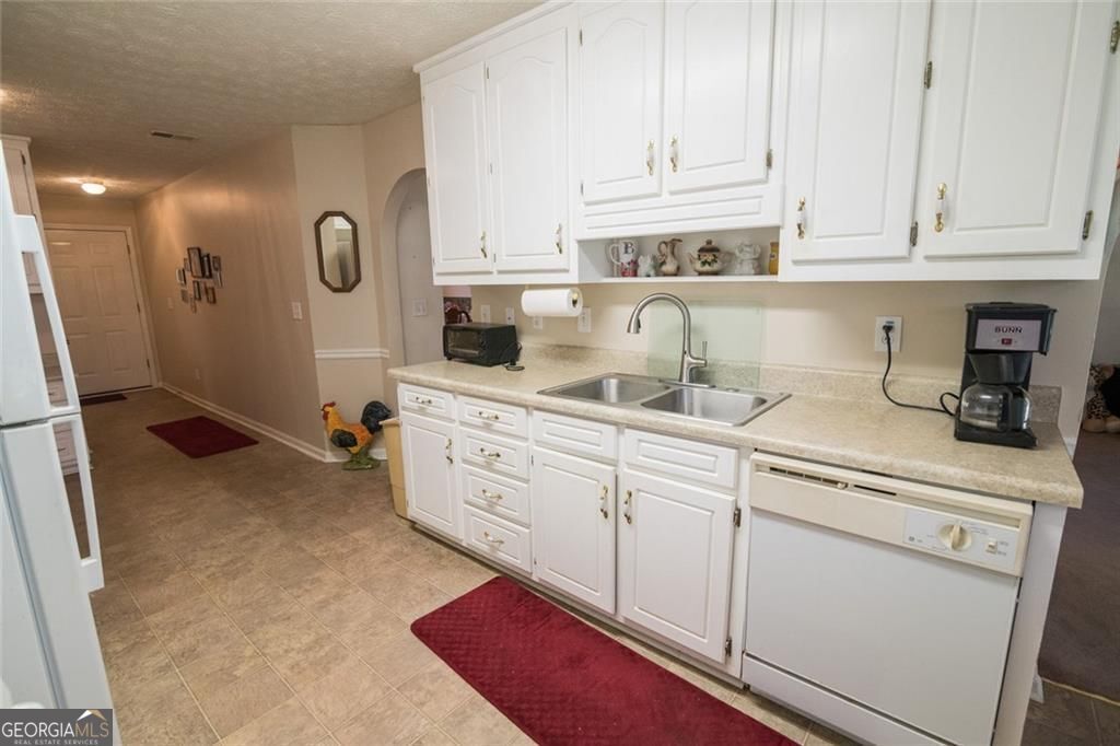 Photo of 1585 Snow Hill Drive, Lawrenceville, GA 30045 (MLS # 10712464)