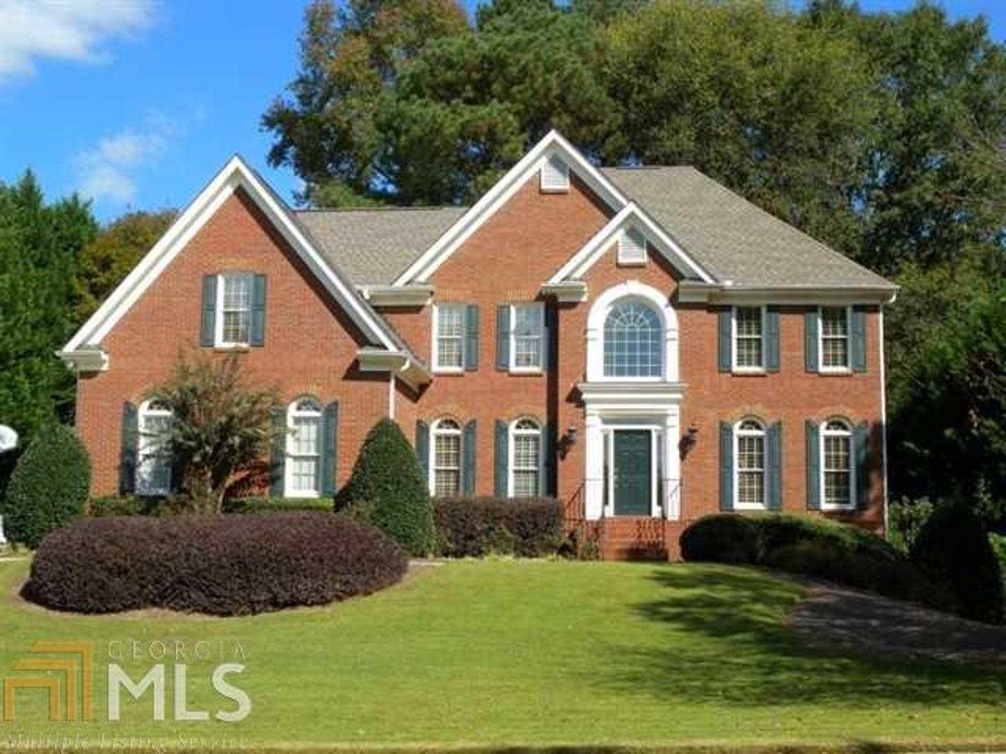 Lovely home in sought-after Sugar Mill Swim/Tennis subdivision - Wilson Creek ES, River Trail MS, Northview HS districts. This 5BR/4BA home is one of the largest floor plans in Sugar Mill featuring formal living room, huge family room, guest suite/office with full bath on the main level, and a sunroom leading to a spacious deck. Updated kitchen, Renovated Master Bath, 3-car garage, hardwood floors throughout, newer roof, 3-sides brick with cement-fiber siding. Beautiful, private, walk-out back yard. This home has been meticulously maintained and is move-in ready.