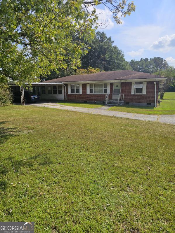 Investor opportunity. This property to be sold with 5263 Salem and 5209 Salem. This brick house has 3 bedrooms and 1 1/2 bathrooms. This could be a great fix and rent or flip.