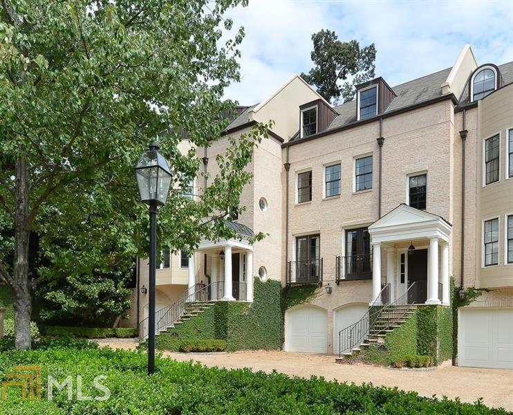 Top quality construction in this spacious townhome! Great convenient location to Buckhead, Phipps and Lenox, Path400 Greenway, highways. Enclave neighborhood. Terrace level with fireplace, full bath and wet bar with French doors to private walled courtyard with fountain. Elevator to all 4 floors, from garage entry up! Main with separate living and dining rooms, eat-in kitchen and fireside family room. 2nd floor offers oversized master with large bath and walk-in closet, additional full bath plus bedroom or office. 3rd floor with two bedrooms plus jack and jill bath.
