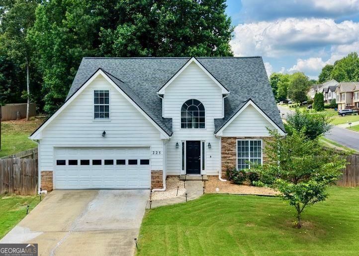 Photo of 225 Shadetree Ln, Lawrenceville, GA 30044 (MLS # 10841701)