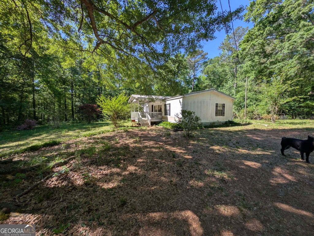 Photo of 460 Etheridge Mill Road, Milner, GA 30257 (MLS # 10740878)