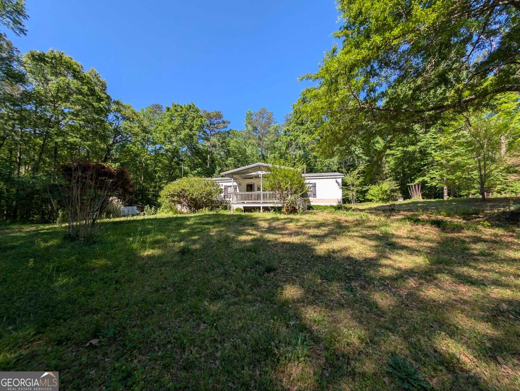 Photo of 460 Etheridge Mill Road, Milner, GA 30257 (MLS # 10740878)