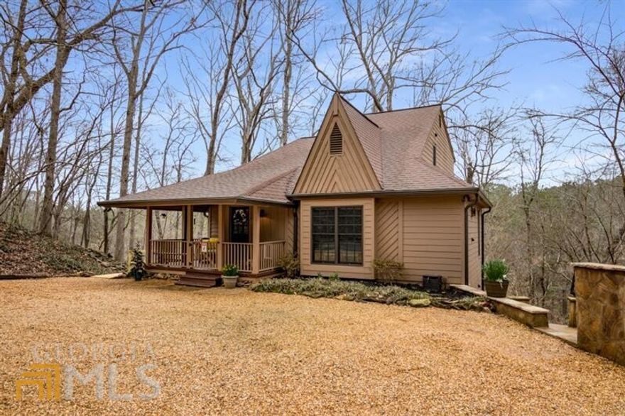 Rare opportunity in Sandy Springs. Mountain-like cabin/cottage retreat with lovely front porch on private, wooded 1.4-acre lot. View beautiful vistas of nature and wildlife from the abundance of windows and three rear decks/porches. This three-level home is in pristine condition (see upgrade sheet in doc section). Wonderful opportunity for multigenerational or roommate living-primary suites on all three levels of the home with dedicated baths and 2 kitchens, 2 great rooms plus 2 laundry rooms. The main level of the home enjoys an open living floor plan with two gas fireplaces-- great room open to dining room and kitchen, pantry, laundry room, 1/2bath plus 1st primary suite/bath and lovely screened rear porch. Upstairs is the delightful sunny and oversized 2nd primary suite/bath with generous closet and storage area. The terrace level offers another family room open to kitchen and dining area plus the 3rd primary suite/bath and laundry area. Also on this level is a large storage area that could easily house a workout area or workshop. Walkout the lower side door to a brand-new low deck/patio with additional area that could be grassed and/or fenced for pets or children. Extended driveway provides complete privacy and easy parking for multiple vehicles. On property well (currently not being used) that could provide water for an irrigation system. Easy access to GA 19 and GA 400 with proximity to Roswell, Dunwoody, East Cobb and all the recreational sites along the Chattahoochee River.