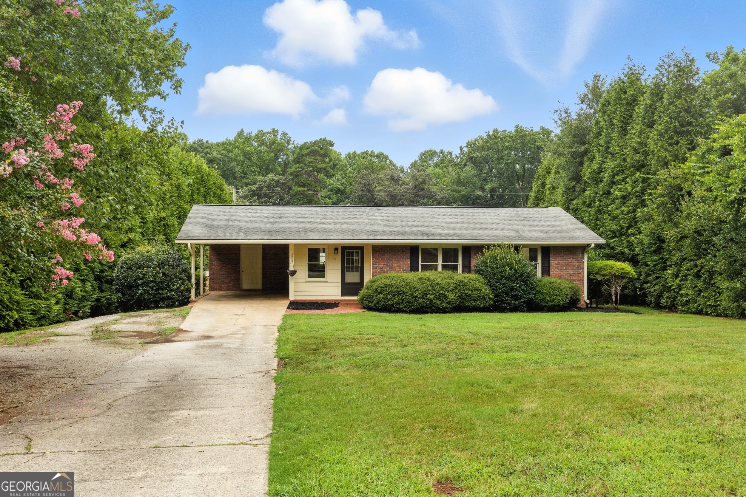 Charming Brick Ranch on Nearly Half an Acre! Welcome to your peaceful retreat just minutes from town! Nestled in a quiet, established neighborhood, this classic 2-bedroom, 2-bath brick home sits on a spacious and level .45-acre lot with mature landscaping and plenty of privacy. Inside, you'll find a bright and inviting layout with a cozy living area and a breakfast/dining nook just off the kitchen-perfect for morning coffee or weeknight dinners. Both bedrooms are generously sized, and the two full bathrooms add convenience and flexibility. Enjoy the best of both worlds-a serene setting with quick access to shopping, dining, and all the essentials of town life. Whether you're a first-time buyer, looking to downsize, or just want a low-maintenance home with space to enjoy, this one is a must-see!