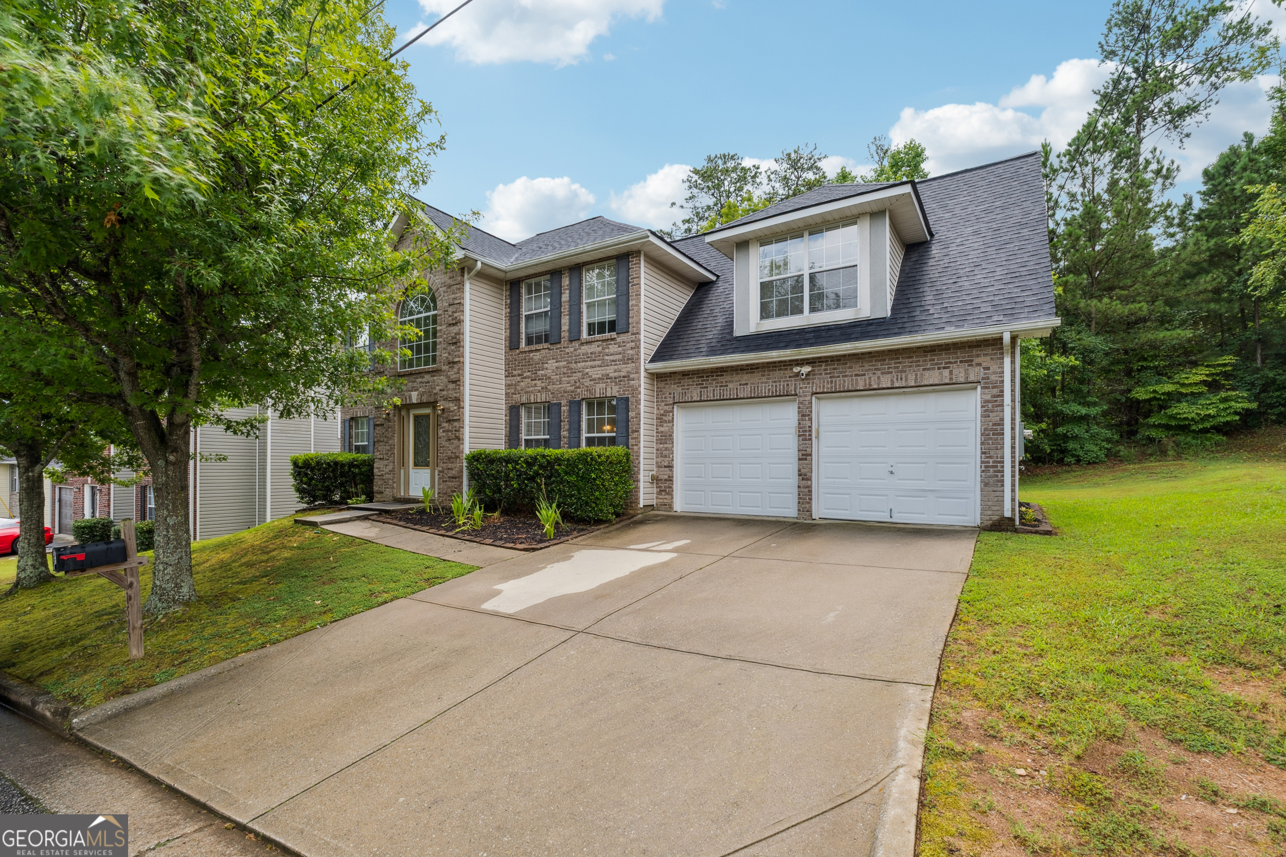 Welcome to 1593 Cutters Mill Dr, a well-maintained home that showcases true pride of ownership. This inviting residence features tall ceilings that create an open and airy feel throughout, complemented by a cozy fireplace-perfect for relaxing evenings. You'll love the spacious bedrooms, each offering comfort and room to grow. Whether you're entertaining or enjoying quiet nights in, this home combines character, charm, and functionality in one. Located in a peaceful Lithonia neighborhood with easy access to local amenities, this is a home you'll be proud to call your own.