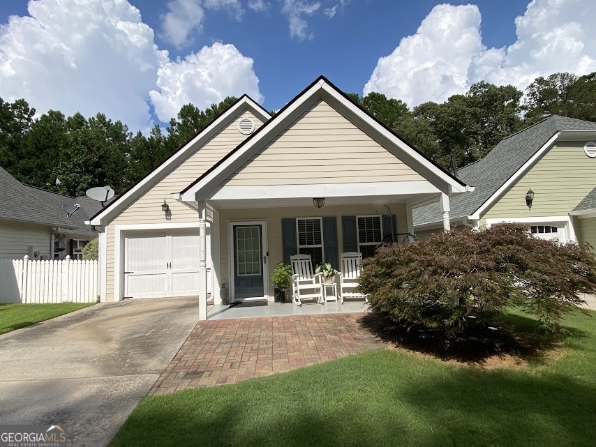 Look at this beautiful ranch home that boasts of 2 bedrooms, 2 baths, a sunroom, and lots of great upgrades! New HVAC and air handler in 2022. New roof in 2021. Fresh paint, new Pergo 12mm flooring, updated light fixtures, custom Roman bamboo shades. The enclosed sunroom will bring days of enjoyment and relaxation. The master bedroom has a wonderful sitting area, a linen closet, and a spacious walk-in closet. Carrollton City schools, great neighborhood, convenient to downtown Carrollton and I-20.