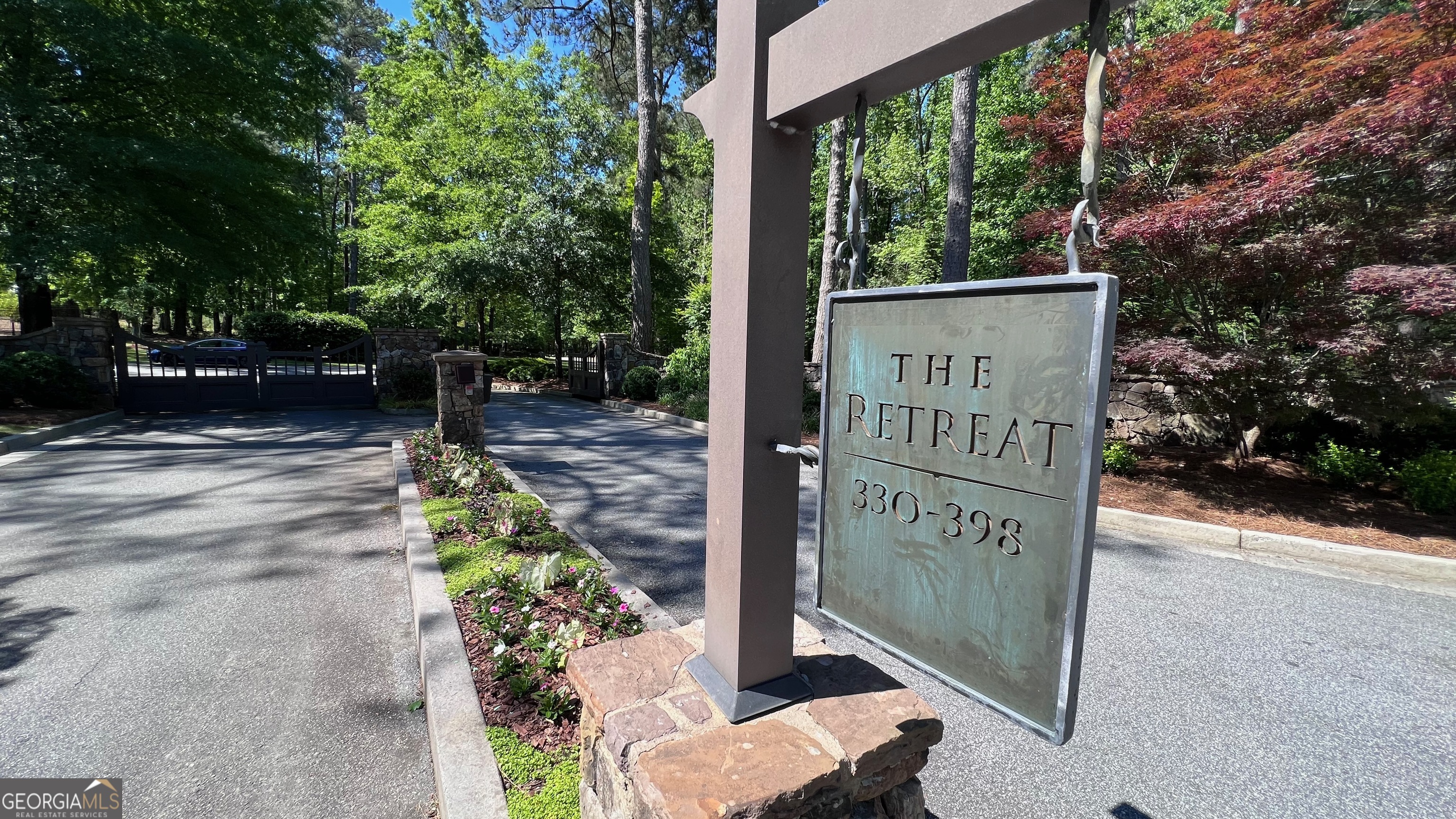 BUILD YOUR DREAM HOME Step into the realm of luxury intertwined with nature at The Retreat at Kennesaw Mountain! A captivating opportunity awaits you with this alluring half-acre vacant lot at 354 The Retreat, Marietta, GA Co a canvas for your bespoke dream home. Nestled within an intimate enclave of just 18 custom home lots, this parcel is neighbored by some of Marietta's most exquisite and opulent residences. A secured gated entrance ensures your desired level of privacy and tranquility. Situated gracefully along Burnt Hickory Road, this location boasts proximity to the Kennesaw Mountain National Park, offering an extensive network of 22 miles of hiking trails and breathtaking natural vistas. Conveniently connected to I-75, a mere 5 miles away, you'll effortlessly access Towne Center Mall and the surrounding amenities. For cycling enthusiasts, discover new bike trails that seamlessly lead you to the vibrant Marietta Square, located only 3 miles away. The locale also places you in close proximity to the esteemed Marietta Country Club and the Mount Paran Christian School, making it an ideal setting for your loved ones. Seize this remarkable opportunity to craft your dream abode within this exclusive community. Come and experience the fusion of luxury and nature at The Retreat at Kennesaw Mountain Co your vision awaits!