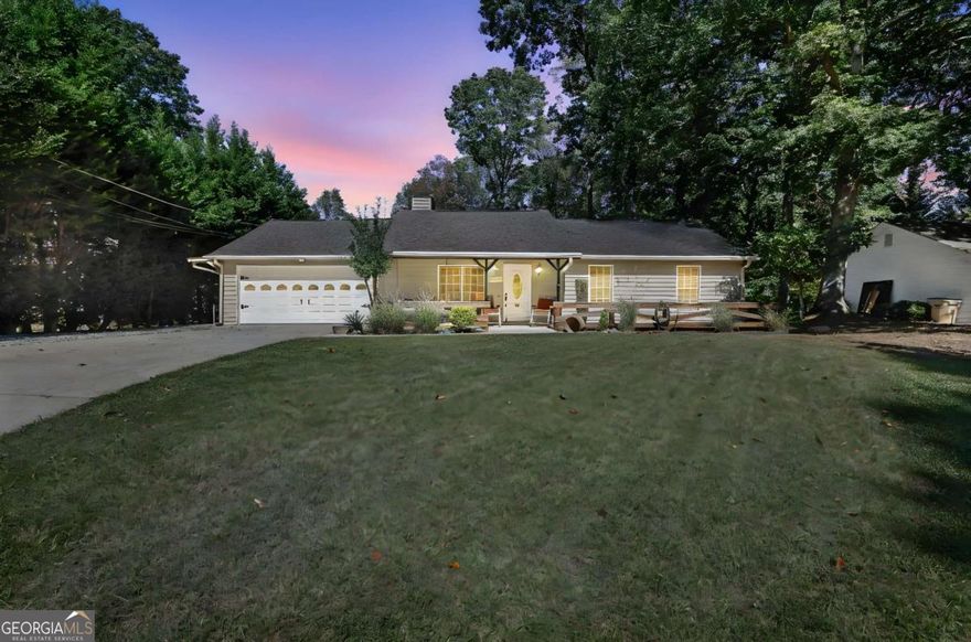 Fall in love with this charming, updated ranch in the HIGHLY SOUGHT AFTER BUFORD CITY SCHOOLS! Thoughtfully designed for comfort and entertaining, this home features two spacious primary bedrooms, each with its own en suite bath, gorgeous updated flooring, and a finished bonus room offering flexible living space. The stunning covered outdoor kitchen is perfect for year-round gatherings, while the quiet, level lot with a fenced backyard, workshop, and storage shed provides both function and charm. Enjoy the unbeatable location near BOGAN PARK'S aquatic center, ball fields, and scenic walking trails, as well as great restaurants, shopping, and the vibrant Historic Downtown Buford-truly a home that blends convenience, character, and lifestyle! Home includes a HOME WARRANTY for extra peace of mind. NO HOA!  Preferred closing attorney: O'Kelly & Sorohan.
