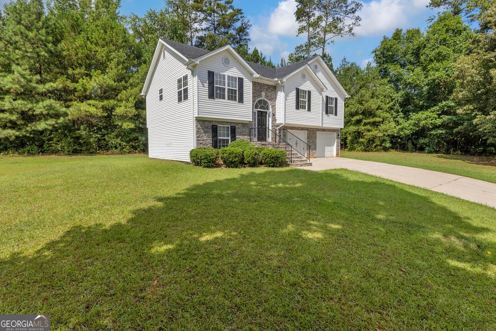 Photo of 145 Clover Valley Drive, Covington, GA 30016 (MLS # 10822406)
