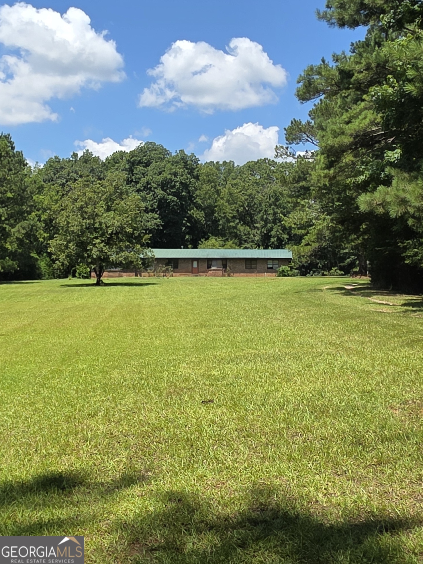 Welcome to your slice of country paradise! This home sits on 11.2 acres in the coveted area known for its tranquil, rural atmosphere while remaining conveniently connected to everyday amenities. The property offers incredible renovation potential for those ready to create something truly special. Hardwood floors throughout. 4 bedrooms and 2 baths. Lots of land provides room to roam, gardens or simply enjoy the peaceful privacy that makes this sought-after location so desirable. This property represents an exceptional opportunity to secure a piece of Georgia's beautiful horse country at an attractive price point. Come check out this hidden gem.