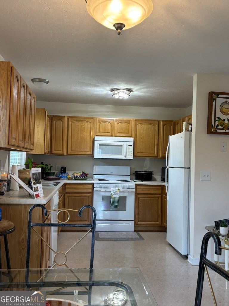 Photo of 405 Crawfordville Road, Union Point, GA 30669 (MLS # 10804127)